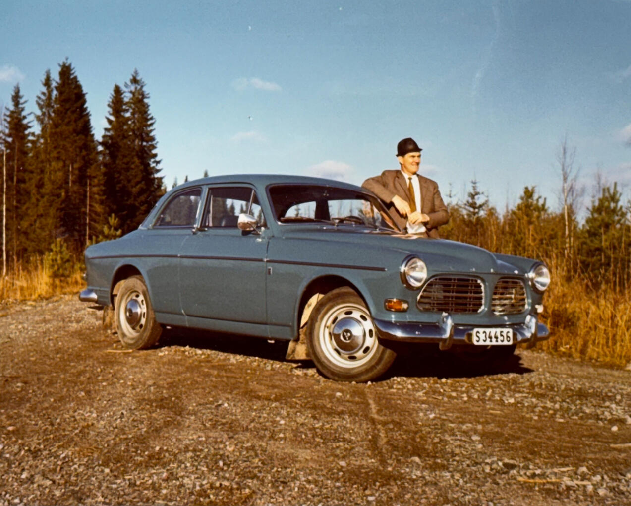 My grandfather with his Volvo Amazon in the forests of Värmland, back in the 70s.